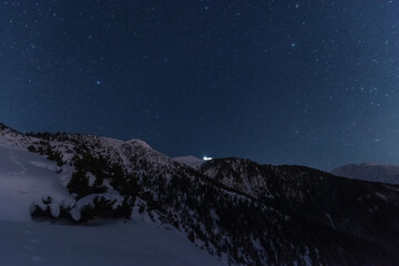 Wall Mural - bright starry sky with the milky way on the background of high tatras mountains