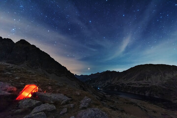 Wall Mural - bright starry sky with the milky way on the background of high tatras mountains