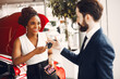 © prostooleh - Stylish black woman in a car salon