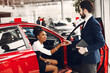 © prostooleh - Stylish black woman in a car salon
