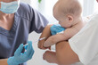 © Angelov - Pediatrician makes vaccination to small boy