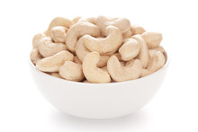 Close-up Organic Dry Fruit Cashew Nut (Anacardium Occidentale)  In White Ceramic  Bowl On White Background