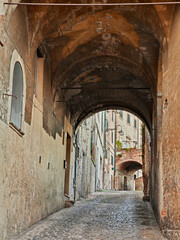 Wall Mural - Jesi, Ancona, Marche, Italy: picturesque narrow alley in the old town of the ancient Italian city