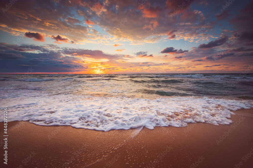 Beautiful sunrise over the sea and tropical beach, paradise island and waves - obrazy, fototapety, plakaty 