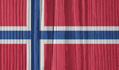 The flag of Norway on a dry wooden surface, cracked with age. It seems to flutter in the wind. Background, wallpaper or backdrop with national symbol. Scandinavian cross. Hard sunlight with shadows