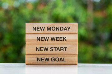 Wall Mural - New Monday, New week, new start, new goal text on wood block