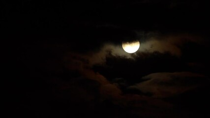 Wall Mural - Clouds drifting across the sky. scary full moon in the dark