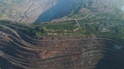 Wall Mural - huge iron ore quarry iron ore mining aerial video filming drone top view flight over