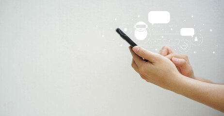 close up man hand use smartphone to contact provider and talk with ai chatbot software program for business marketing concept