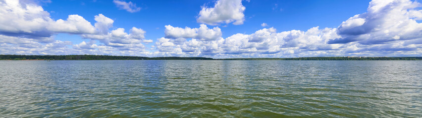 Wall Mural - Beautiful natural summer landscape with picturesque lake Senezh and cloudy sky. Moscow region, Russia 