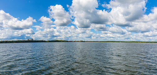 Wall Mural - Beautiful natural summer landscape with picturesque lake Senezh and cloudy sky. Moscow region, Russia 