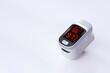 © Prapat - Portable pulse oximeter device on white background, Measurement of blood oxygen level and pulse