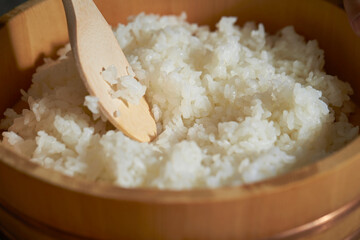 Wall Mural - Rice mixed with vinegar in bamboo tableware