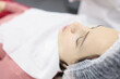 © megaflopp - Woman lies in beauty salon before rejuvenating procedure