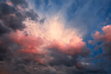 Abstract Nature Background. Dramatic And Moody Pink, Purple And Blue Cloudy Sunset Sky. Red Cloudscape Area. Bright Mood Wallpaper. Heaven. Colorful Backdrop. After Storm. Springtime. Cumulus Clouds