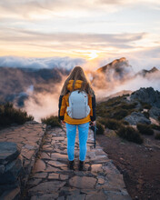 A Young Adventurous Woman Traveling And Hiking Alone In The Mountains Of Madeira In Portugal. High Quality Photo