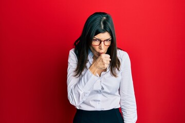 Wall Mural - Young hispanic woman wearing business shirt and glasses feeling unwell and coughing as symptom for cold or bronchitis. health care concept.