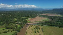 Large Aerial View Over Crocodile Bridge Costa Rica Agricultural Landscape