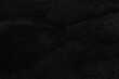 © torsakarin - Dark grey black slate background or texture. Black granite slabs background