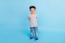 Full Length Body Size View Of Nice Cheerful Boy Baby Wearing Casual Look Isolated Over Bright Blue Color Background