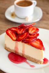 Wall Mural - Piece of cheesecake with fresh strawberries