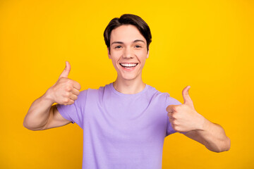 Sticker - Portrait of attractive cheerful successful guy showing double thumbup ad trust isolated over bright yellow color background