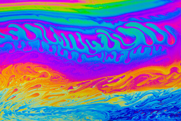 Wall Mural - rainbow colors. psychedelic multi colored patterns background. photo macro shot of soap bubbles