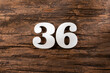 thirty six 36 - White wooden number on rustic background