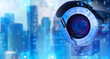 Anti-vandal surveillance system. Outdoor CCTV camera close-up. CCTV camera symbolizes surveillance. Abstract tech background behind camera. Concept - sale of video surveillance system.