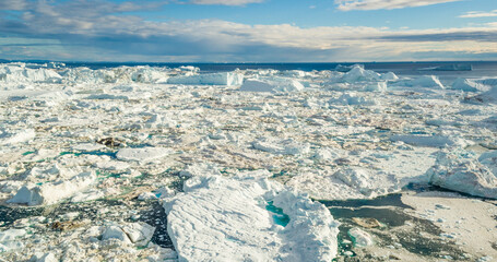 Wall Mural - climate change. iceberg rom glacier in arctic nature landscape on greenland. icebergs in ilulissat i