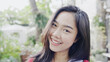 © Rapeepat - Face Beautiful Asian teenage woman smiling happy. good mental health positive thinking about lifestyle. good dental health. looking at camera