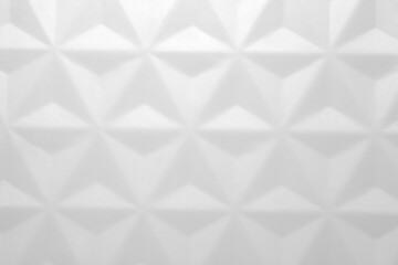 Wall Mural - Geometric white plastic texture background. Close-up.