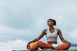 © Jacob Lund - Fitness woman resting after workout on rooftop