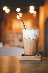 Wall Mural - Iced mocha in a glass decoration with milk on top