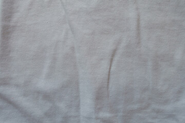 Poster - Creased simple white cotton jersey fabric from above