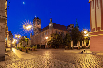 Wall Mural - Torun. Old market square and town hall at sunrise.