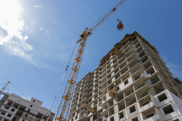 Poster - Construction of a monolithic multi-storey building. Construction of monolithic walls at a construction site.