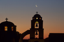 View At Night Sky And Moon With The Greek Ortodox Church In The Foreground