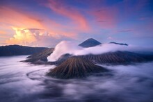Beautiful View Of Mt. Bromo Volcanic Landscape Against Sky During Sunrise