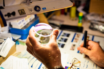 Canvas Print - Production of lenses for spectacles for vision in optics on modern equipment