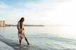 © Milles Studio/Stocksy - Black woman standing in sea water