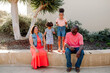 © Erin Brant/Stocksy - Happy Black family with two daughters