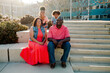 © Erin Brant/Stocksy - Sweet Black family outdoors on steps
