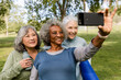 © McKinsey Jordan/Stocksy - Older Women Pose for a Selfie in the Park