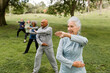 © McKinsey Jordan/Stocksy - Senior Friends Meet For a Workout in the Park