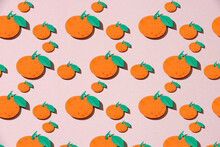 Fruit Made Of Paper. Seamless Pattern From Oranges On A Pink Background.