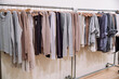 © Trinette Reed/Stocksy - Linen and cashmere clothing on rack