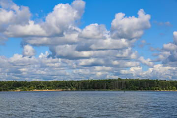 Wall Mural - Beautiful natural summer landscape with picturesque lake Senezh and cloudy sky. Moscow region, Russia