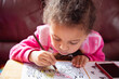 © anya brewley schultheiss/Stocksy - Toddler girl practicing her colouring