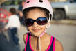 © anya brewley schultheiss/Stocksy - A pretty child wearing large sunglasses and a helmet